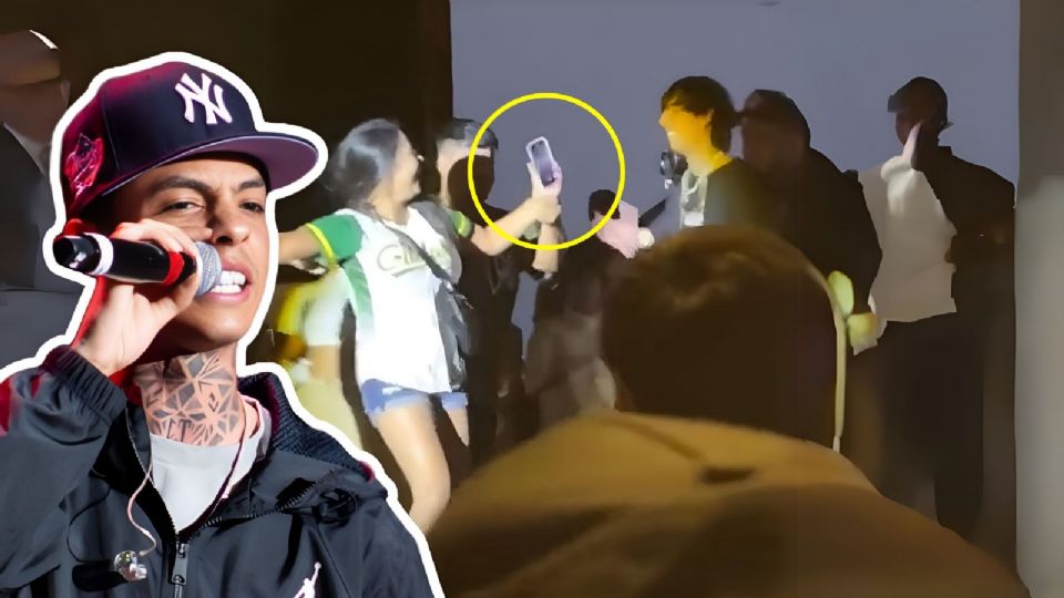 En redes se viralizó un video en que Natanael Cano lanza el celular de una fan.
